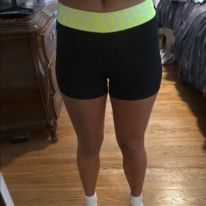 Nike Black and Yellow Athletic Shorts with Stretch Fabric